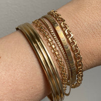 Stack of Vintage 18k gold bracelets