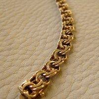 Double link solid 18k gold bracelet 1972  Swedish vintage, 18K gold, 7 inch in inside circumference, a chunky 17.8 grams, perfect working clasp, fully hallmarked, sun catching radiant double link, GORGEOUS!!!! She is a classic you'll wear every day. 18k Yellow gold with a subtle warm rosy tint - stunning.  This link type is called a double-link. Pairs of links run side by side - like two curb chains delicately soldered, link by link, to form a double length of links.
