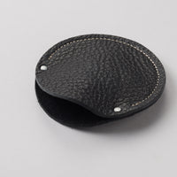 True black leather circular cable case